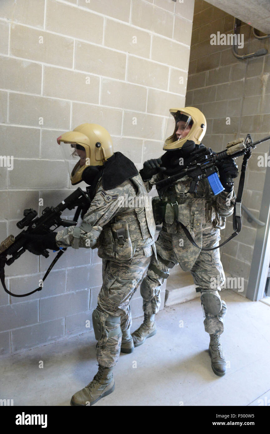 Airman 1st Class Alyssa Sorum, left, and Airman 1st Class Michael Strom ...