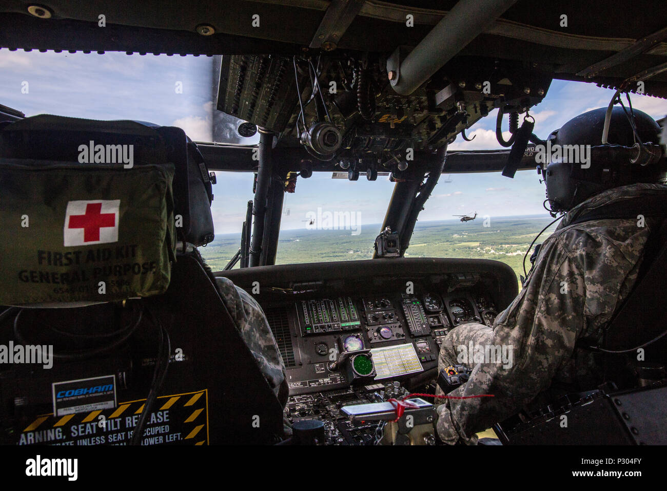 UH-60 Black Hawk aviators with the 1-150th Assault Helicopter Battalion, New Jersey Army National Guard, return to Joint Base McGuire-Dix-Lakehurst, N.J., after participating in a Special Purpose Insertion Extraction (SPIES) demonstration with Tactical Air Control Party Airmen assigned to the New Jersey Air National Guard's 227th Air Support Operations Squadron, at the 2016 Atlantic City Airshow above the Atlantic City, N.J., boardwalk Aug. 17, 2016. (U.S. Air National Guard photo by Master Sgt. Mark C. Olsen/Released) Stock Photo