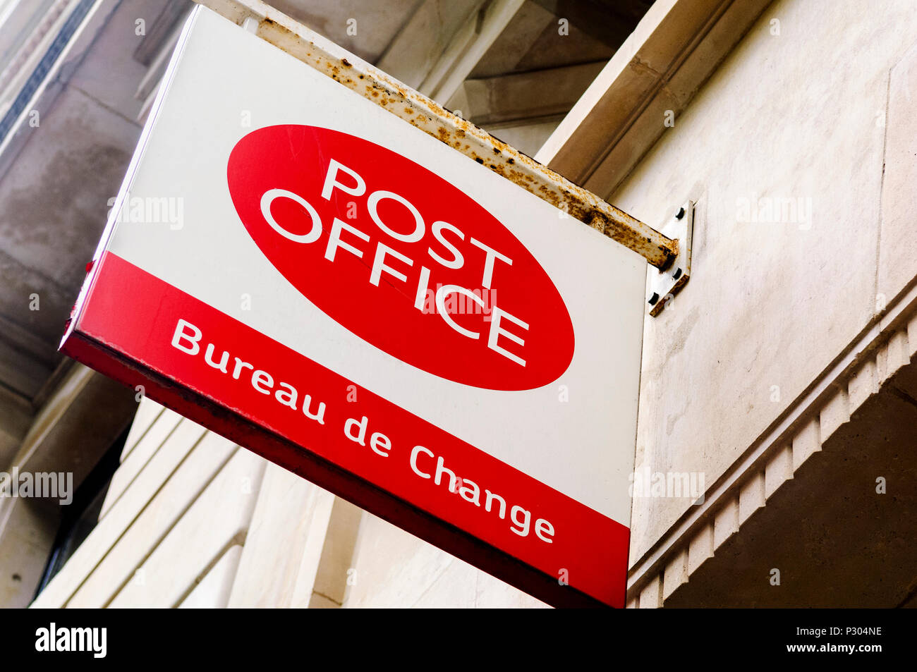 Post Office and Bureau de Change sign in Central London.  Red and white sign. Stock Photo