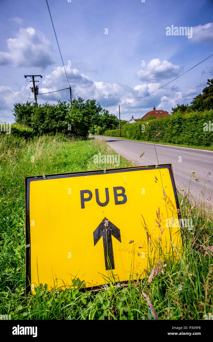 Roadsign indicating the nearest pub Stock Photo Alamy
