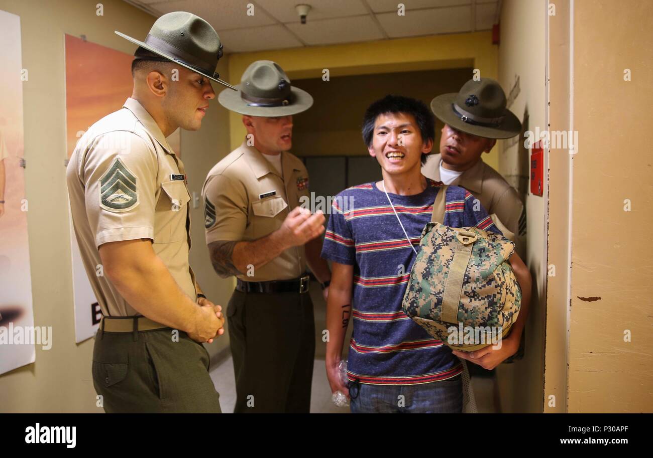 Drill instructors from Receiving Company, Support Battalion, instruct a