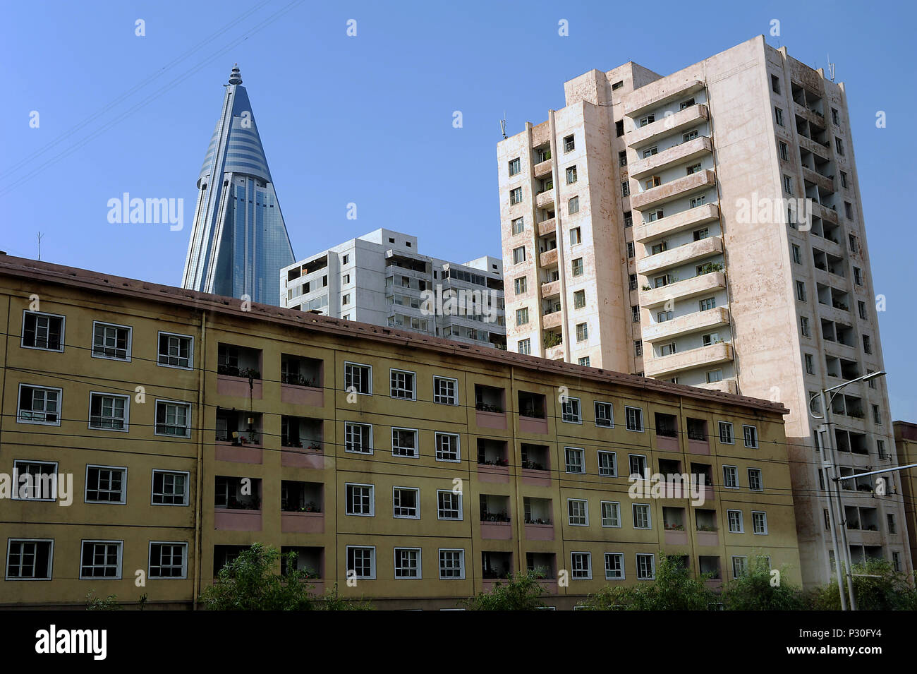 Pyongyang, North Korea, residential buildings and the Ryugyong hotel Stock Photo