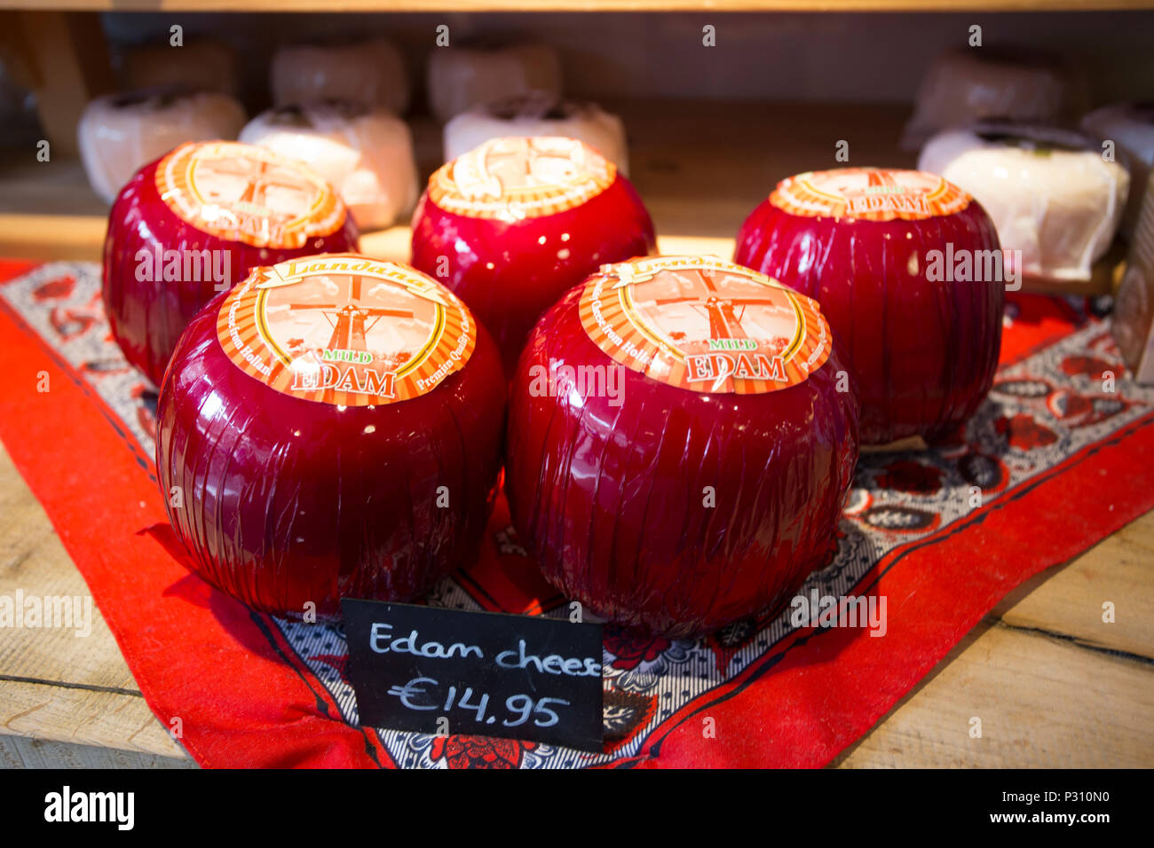 Amsterdam, Netherlands, May 2018, Branded cheeses on display for sale