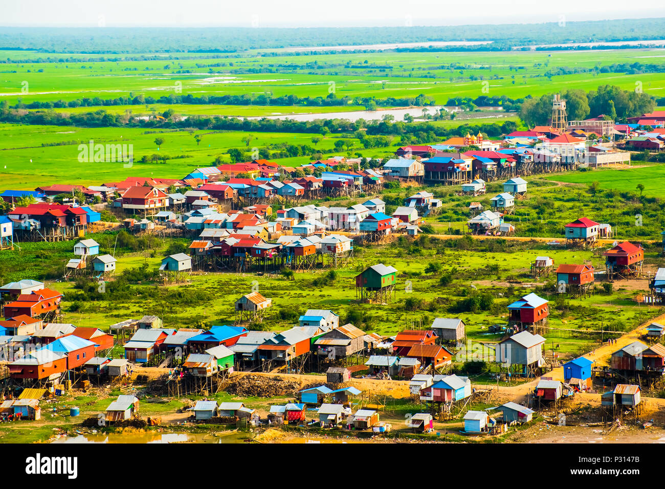 Floating village Phnom Krom, green rice fields, Tonle Sap, Siem Reap, Cambodia Stock Photo