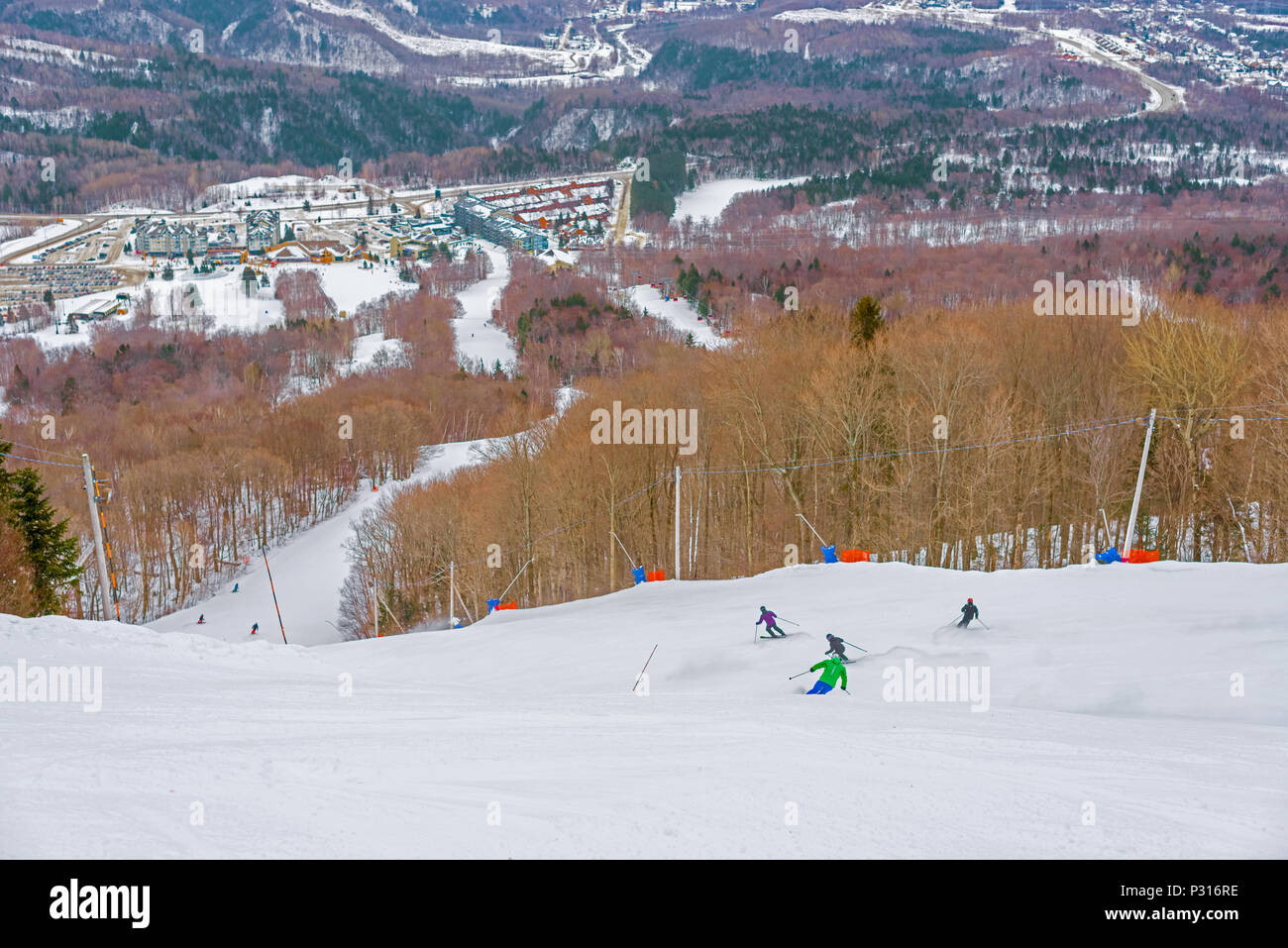 Mont Sainte Anne, Canada January 19, 2016 People skiing downhill in