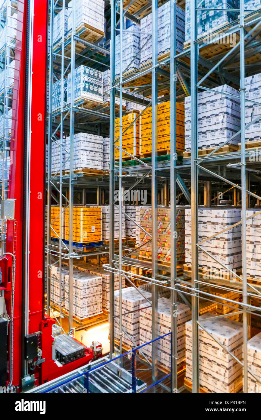 many boxes with bottles of jenever, gin or vodka ready foor sale at warehouse at Nolet distillery in Schiedam, Holland Stock Photo