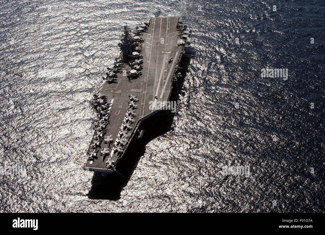 Operation Enduring Freedom (Jan. 16, 2002) - A high altitude view of the Nimitz Class nuclear powered aircraft carrier USS John C. Stennis (CVN 74) while at sea she is  currently conducting missions in support of Operation Enduring Freedom.  The aircraft carrier deployed two months prior to its normal scheduled deployment rotation, to help combat the war on terrorism. Stock Photo