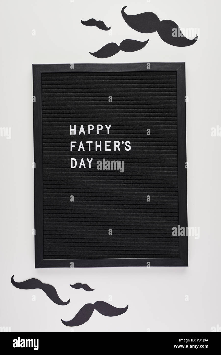 Black Letterboard With White Plastic Letters With Quote Happy Father S Day On White Background With Mustache Stock Photo Alamy Black Letterboard With White Plastic Letters With Quote Happy Father S Day On White Background With Mustache Stock Photo Alamy