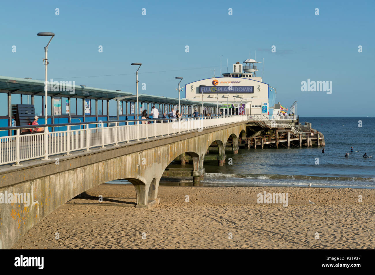 Bournemouth pier and beach with a clear blue sky Stock Photo