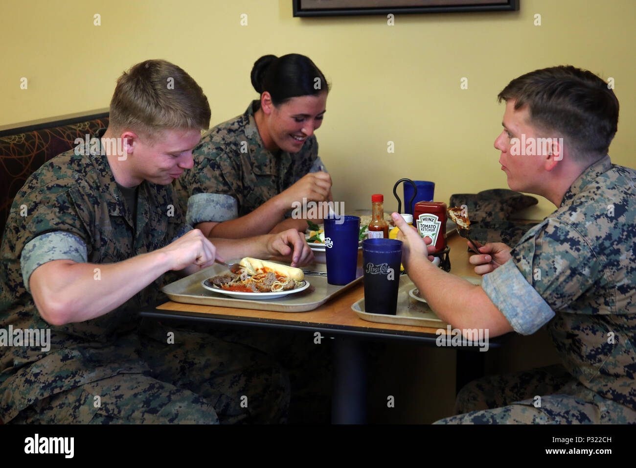 Marines, Sailors and civilians attended a commemorative luncheon celebrating Women’s Equality Day at the mess hall at Marine Corps Air Station Cherry Point, N.C., Aug. 26, 2016. Women’s Equality Day is a day to celebrate women’s right to vote which began on Aug. 26, 1920 with the signing and certification of the 19th Amendment. (U.S. Marine Corps Photo by Sgt. Grace L. Graves/Released) Stock Photo