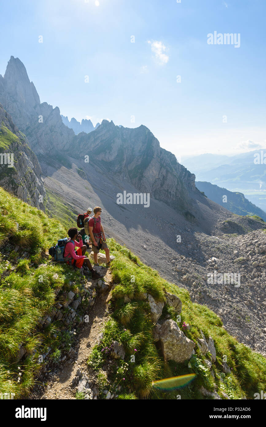 Hiker at Ellmauer Halt, Wilder Kaiser mountains of Austria - close to Gruttenhuette, Going, Tyrol, Austria - Hiking in the Alps of Europe Stock Photo