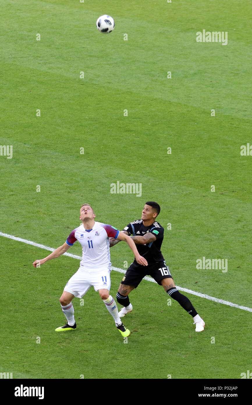 Spartak Stadium, Moscow, Russia. 16th June, 2018. FIFA World Cup Football, Group D, Argentina versus Iceland; Alfred Finnbogason and Marcos Rojo watch the ball come down Credit: Action Plus Sports/Alamy Live News Stock Photo