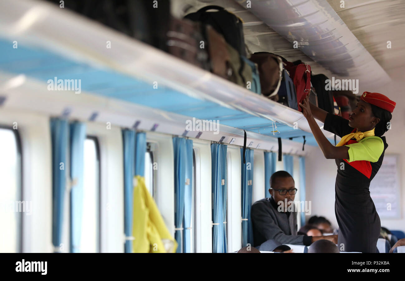 Nairobi. 1st June, 2018. An attendant arranges luggages on a train of  Kenya's Mombasa-Nairobi Standard Gauge Railway (SGR) on June 1, 2018. The  Chinese-built Mombasa-Nairobi SGR of some 480 kilometers has attained