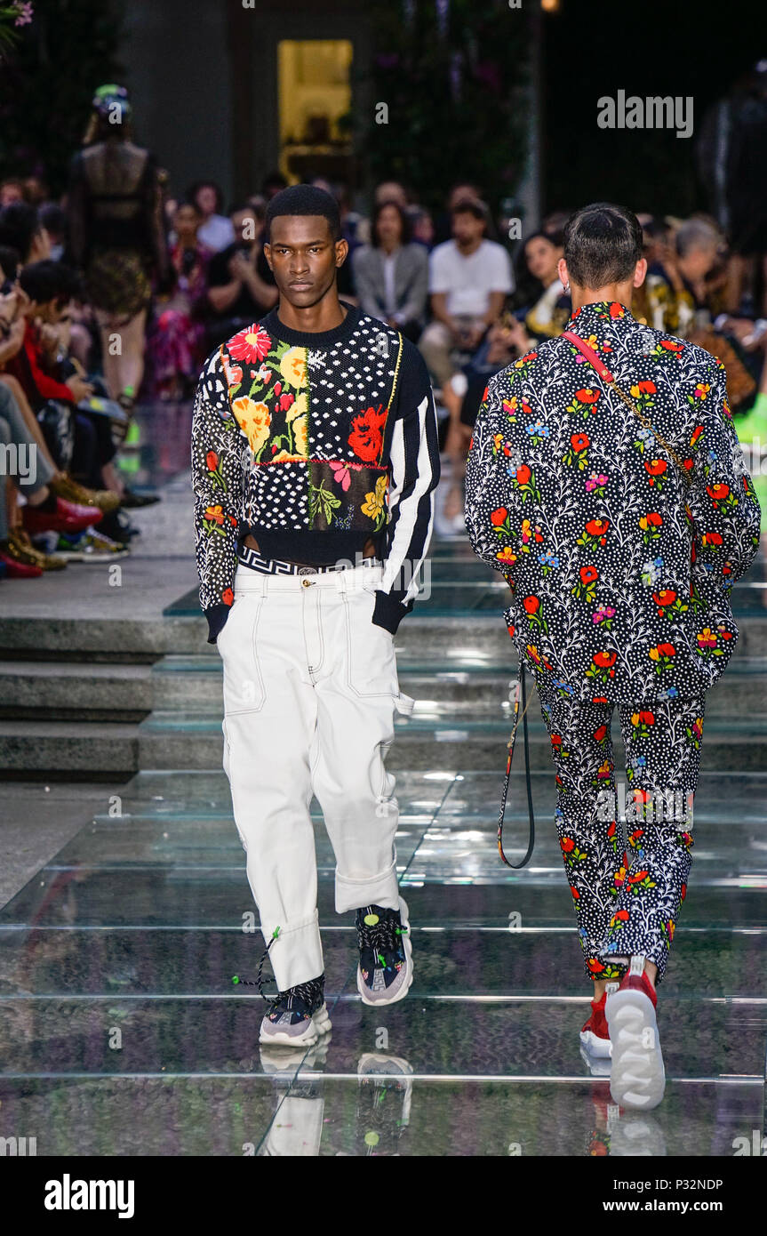 Milan, Italy. 16th June, 2018. Models present creations of Versace during  Milan Men's Fashion Week Spring/Summer 2019 in Milan, Italy, on June 16,  2018. Credit: Wang Jian/Xinhua/Alamy Live News Stock Photo - Alamy