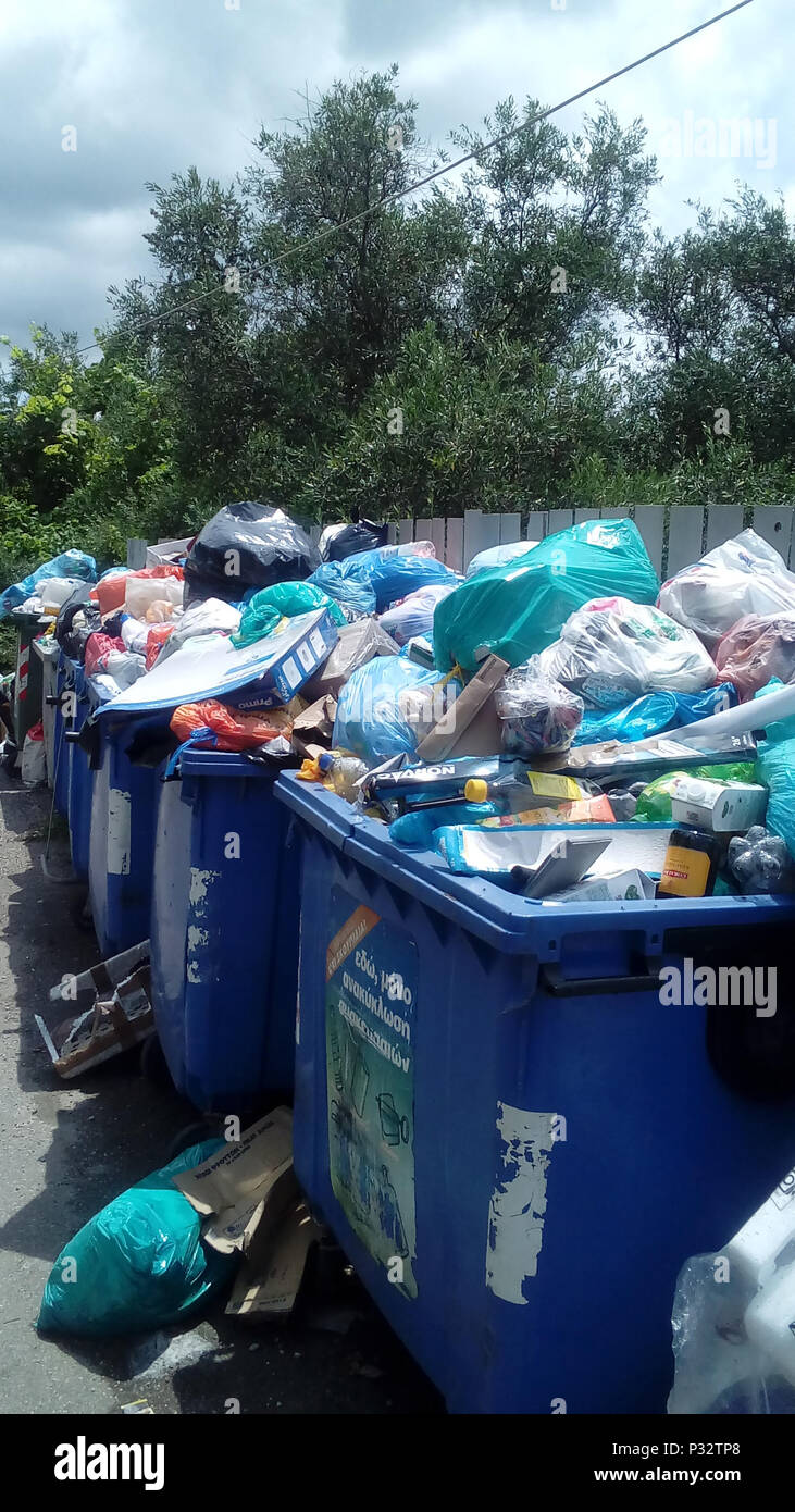 Corfu, Greece, 17 June 2018. Growing concern to health in Corfu, Greece as refuse collections have not been made in many areas for over two months due to dispute with local residents over landfill operations Credit: AMANDA YOUNG/Alamy Live News Stock Photo