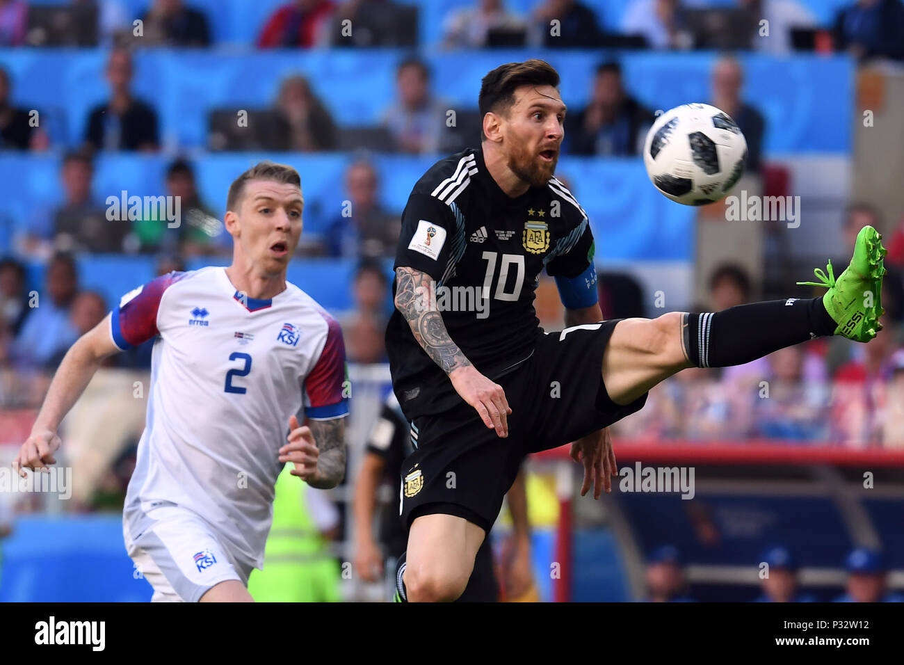 16 June 2018, Russia, Moscow, Soccer, FIFA World Cup 2018, Group D, Matchday 1 of 3, Argentina vs Iceland at the Spartak Stadium: Lionel Messi from Argentina (R) and Birkir Mar Saevarsson from Iceland fight for the ball. Photo: Federico Gambarini/dpa Stock Photo