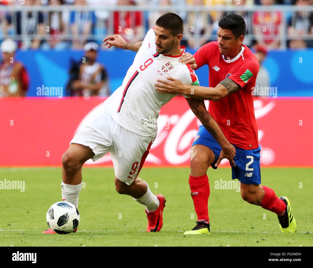 Samara, Russia. 17th June, 2018. Aleksandar Mitrovic (L) of Serbia vies with Johnny Acosta of Costa Rica during a group E match between Costa Rica and Serbia at the 2018 FIFA World Cup in Samara, Russia, June 17, 2018. Credit: Ye Pingfan/Xinhua/Alamy Live News Stock Photo
