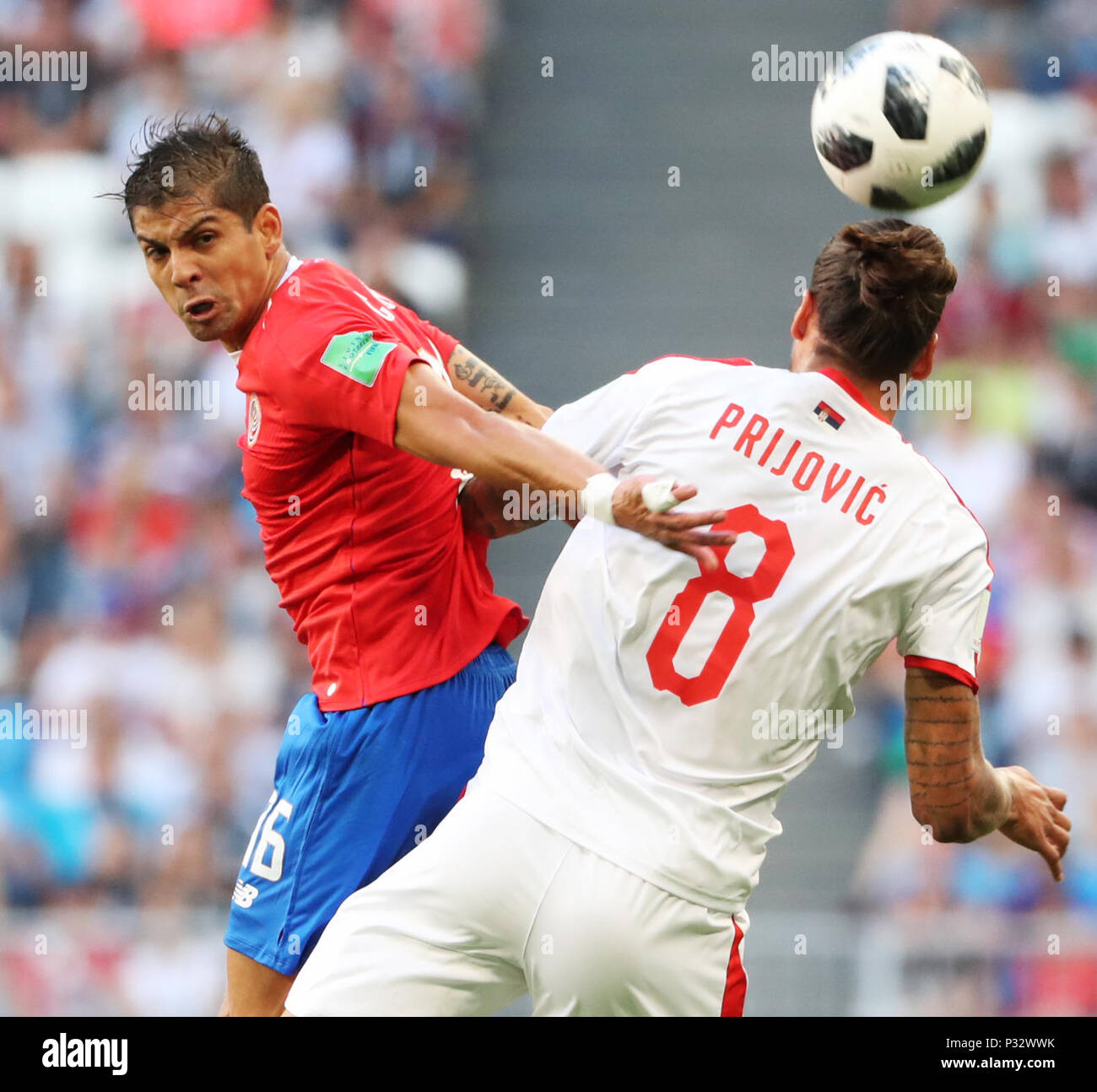 Samara, Russia. 17th June, 2018. Cristian Gamboa (L) of Costa Rica competes for a header with Aleksandar Prijovic of Serbia during a group E match between Costa Rica and Serbia at the 2018 FIFA World Cup in Samara, Russia, June 17, 2018. Serbia won 1-0. Credit: Ye Pingfan/Xinhua/Alamy Live News Stock Photo