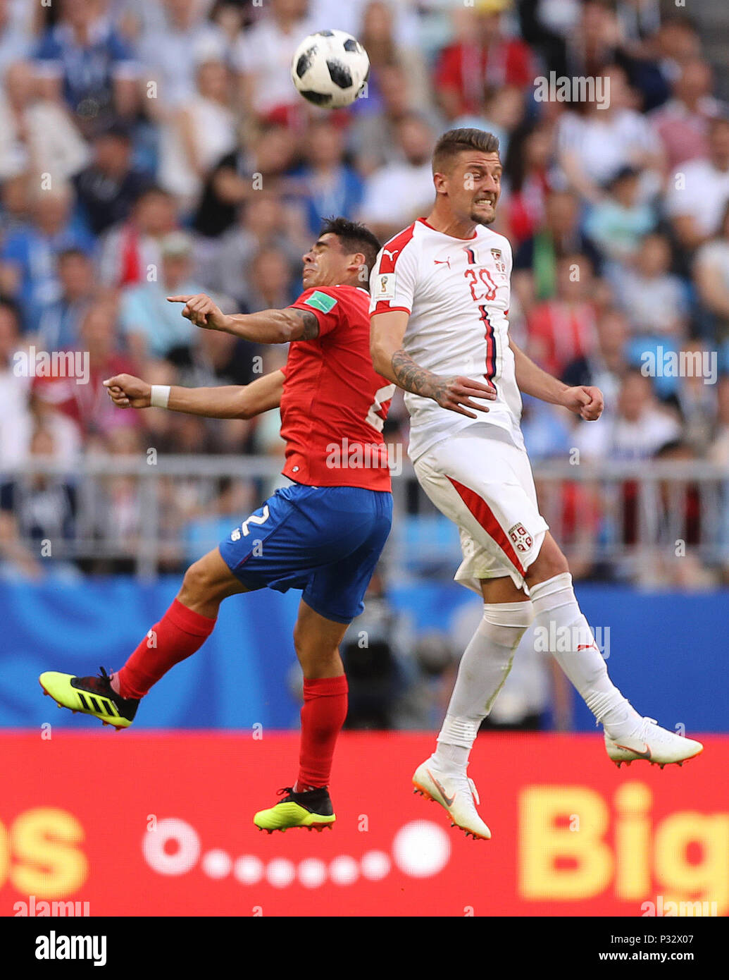 Samara, Russia. 17th June, 2018. Sergej Milinkovic-Savic (R) of Serbia vies with Johnny Acosta of Costa Rica during a group E match between Costa Rica and Serbia at the 2018 FIFA World Cup in Samara, Russia, June 17, 2018. Serbia won 1-0. Credit: Fei Maohua/Xinhua/Alamy Live News Stock Photo