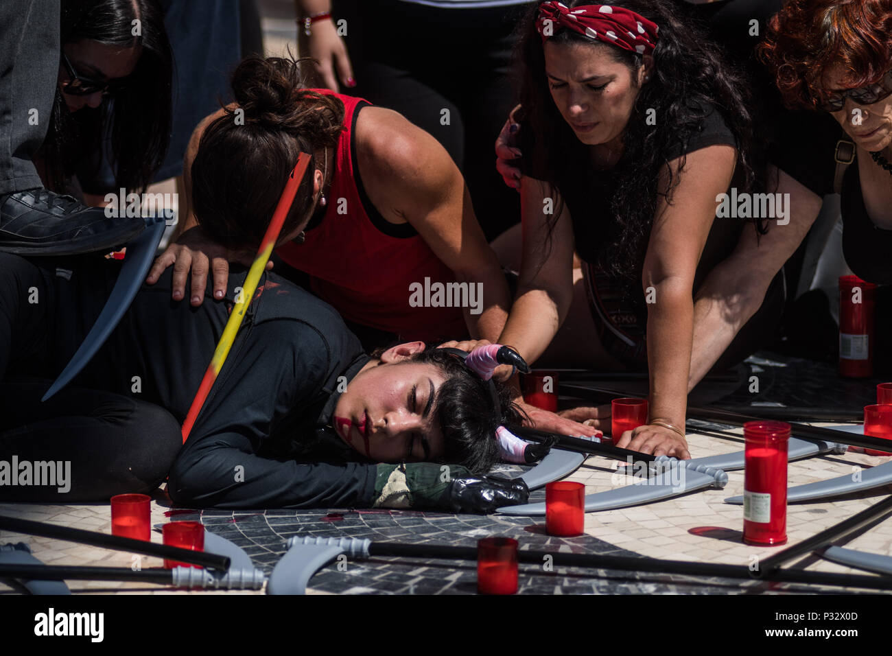Alicante, Spain. 17th June, 2018. Anti-bullfighting protesters perform demanding the abolishment of bullfighting and animal suffering, in Alicante, Spain. Credit: Marcos del Mazo/Alamy Live News Stock Photo