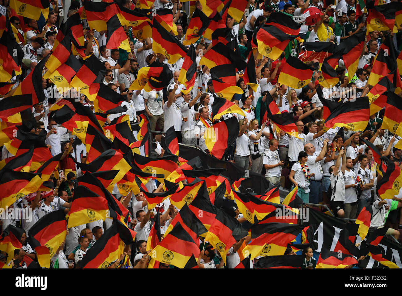 Moscow, Russia. 17th June, 2018. Fans of Germany cheer prior to a group F match between Germany and Mexico at the 2018 FIFA World Cup in Moscow, Russia, June 17, 2018. Credit: Wang Yuguo/Xinhua/Alamy Live News Stock Photo