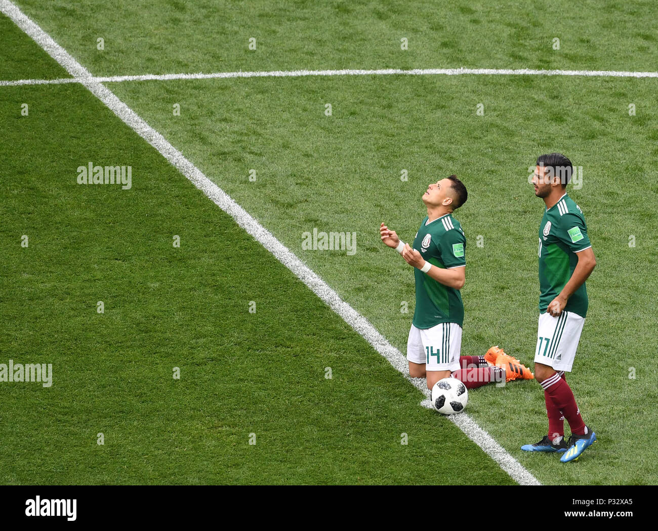 Moscow, Russia. 17th June, 2018. Javier Hernandez (L) of Mexico prays prior to a group F match between Germany and Mexico at the 2018 FIFA World Cup in Moscow, Russia, June 17, 2018. Credit: Wang Yuguo/Xinhua/Alamy Live News Stock Photo