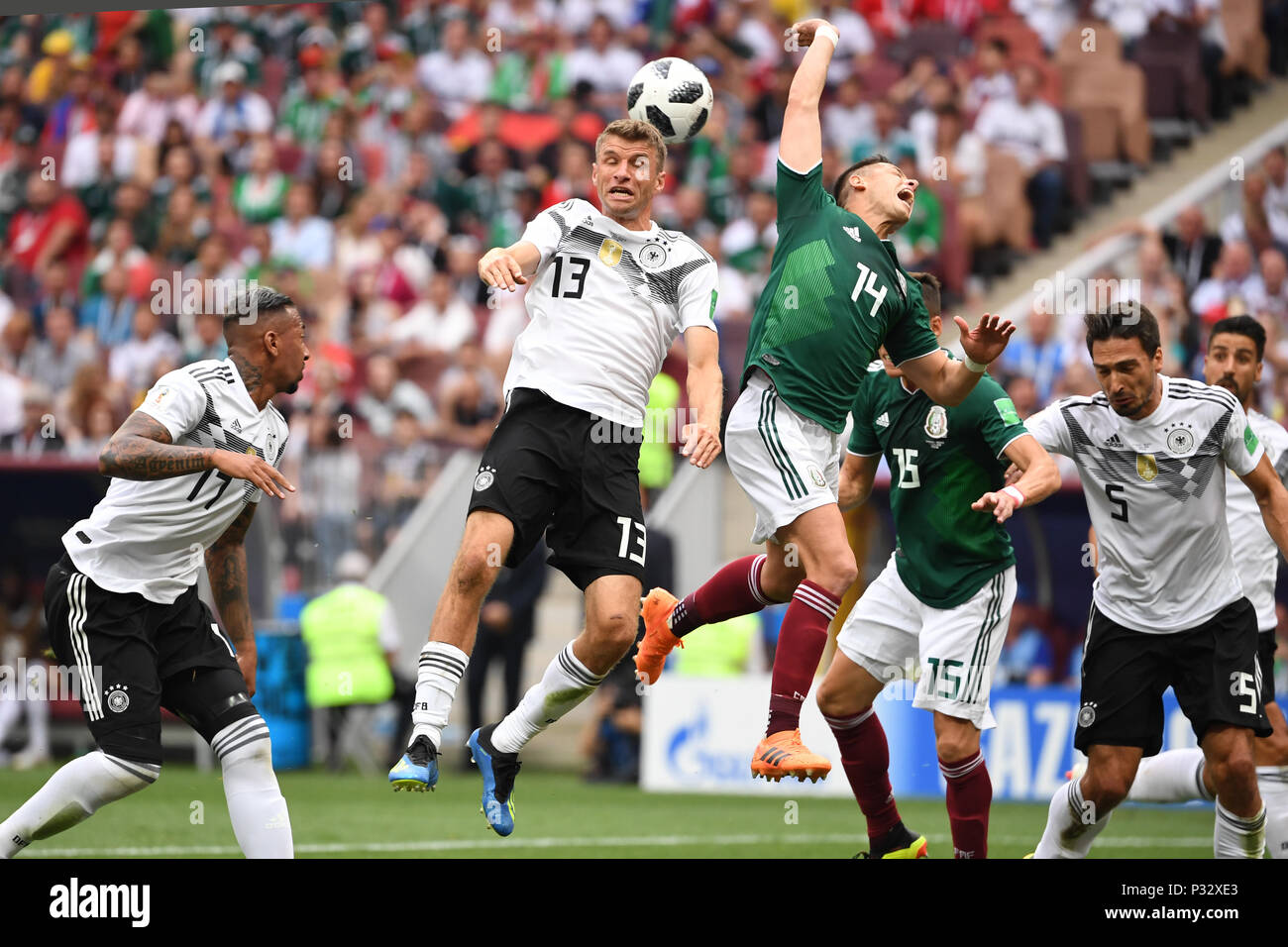 Moscow, Russia. 17th June, 2018. left to right Jerome Boateng (Germany), Thomas Mueller (Germany), Javier Hernandez (Mexico). GES/Football/World Cup 2018 Russia: Germany - Mexico, 17.06.2018 GES/Soccer/Football/Worldcup 2018 Russia: Germany vs Mexico, Moscow, June 17, 2018 | usage worldwide Credit: dpa/Alamy Live News Stock Photo
