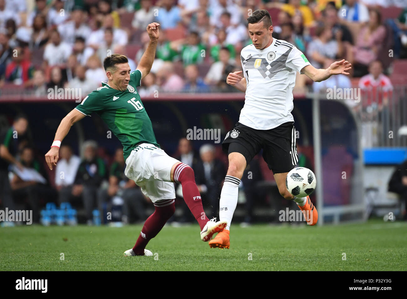 Moscow, Russia. 17th June, 2018. Hector Herrera (Mexico, l.) Versus Julian Draxler (Germany, r.). GES/Football/World Cup 2018 Russia: Germany - Mexico, 17.06.2018 GES/Soccer/Football/Worldcup 2018 Russia: Germany vs Mexico, Moscow, June 17, 2018 | usage worldwide Credit: dpa/Alamy Live News Stock Photo