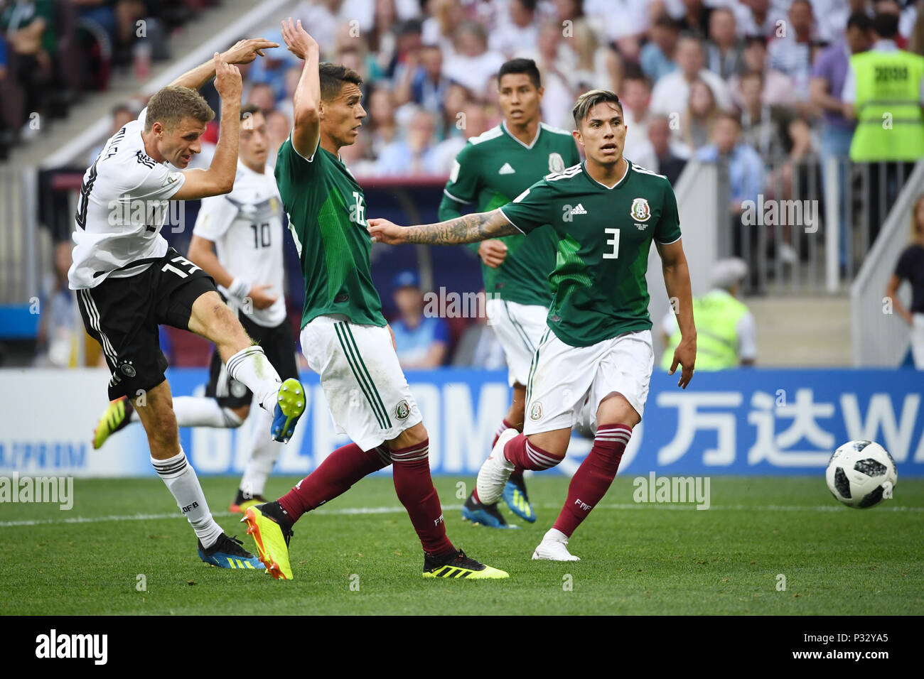 Moscow, Russia. 17th June, 2018. left to right Thomas Mueller (Germany), Hector Herrera (Mexico), Carlos Salcedo (Mexico). GES/Football/World Cup 2018 Russia: Germany - Mexico, 17.06.2018 GES/Soccer/Football/Worldcup 2018 Russia: Germany vs Mexico, Moscow, June 17, 2018 | usage worldwide Credit: dpa/Alamy Live News Stock Photo