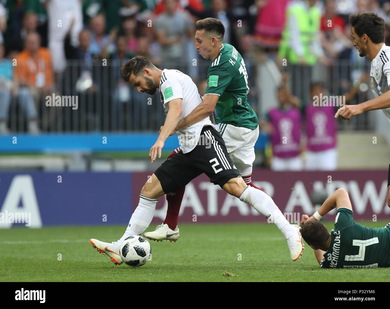Moscow, Russia. 17th June, 2018. Marvin Plattenhardt (L) of Germany vies with Hector Herrera of Mexico during a group F match between Germany and Mexico at the 2018 FIFA World Cup in Moscow, Russia, June 17, 2018. Credit: Xu Zijian/Xinhua/Alamy Live News Stock Photo