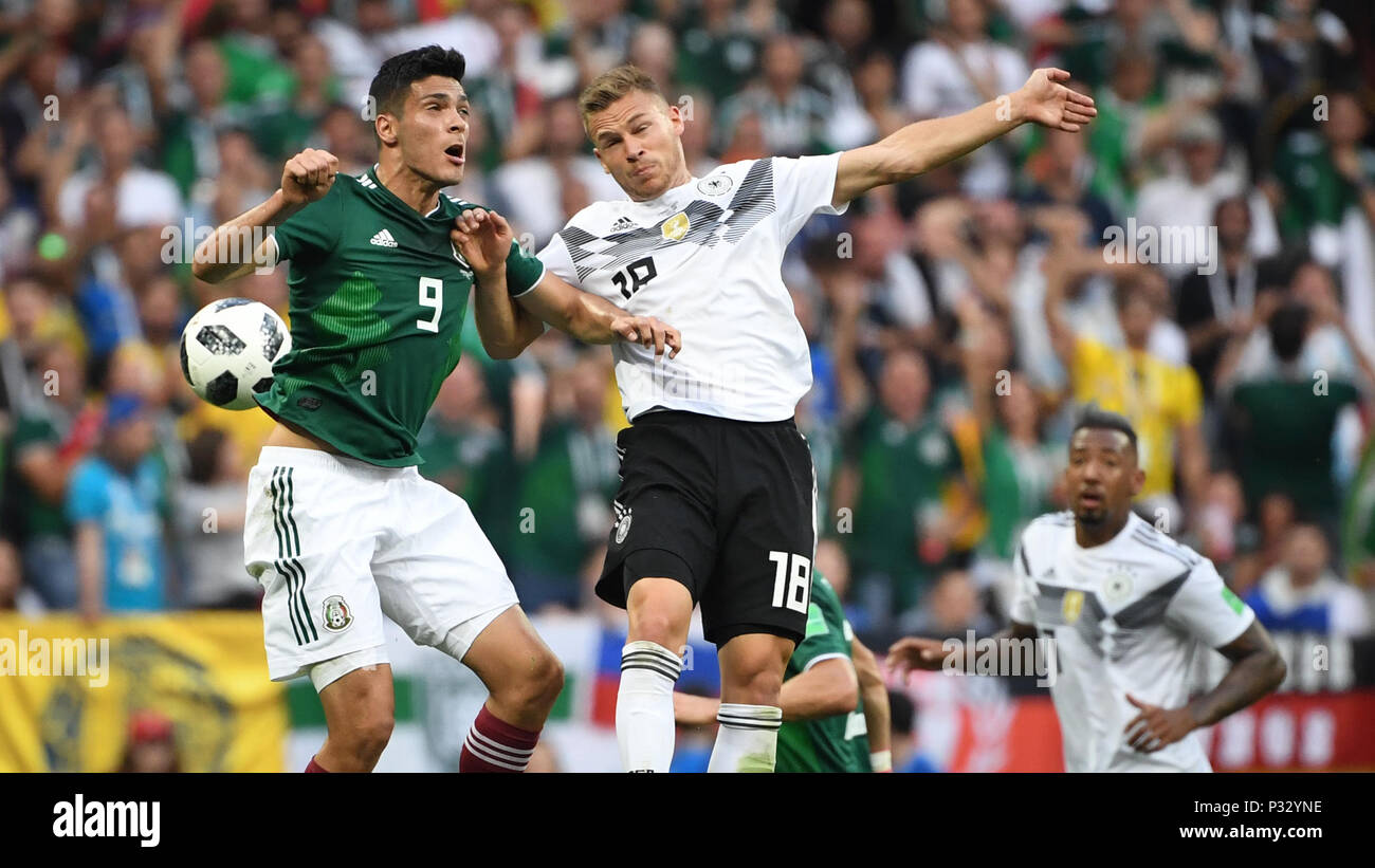 Moscow, Russia. 17th June, 2018. Raul Jimenez (Mexico, l.) Versus Joshua Kimmich (Germany, r.). GES/Football/World Cup 2018 Russia: Germany - Mexico, 17.06.2018 GES/Soccer/Football/Worldcup 2018 Russia: Germany vs Mexico, Moscow, June 17, 2018 | usage worldwide Credit: dpa/Alamy Live News Stock Photo