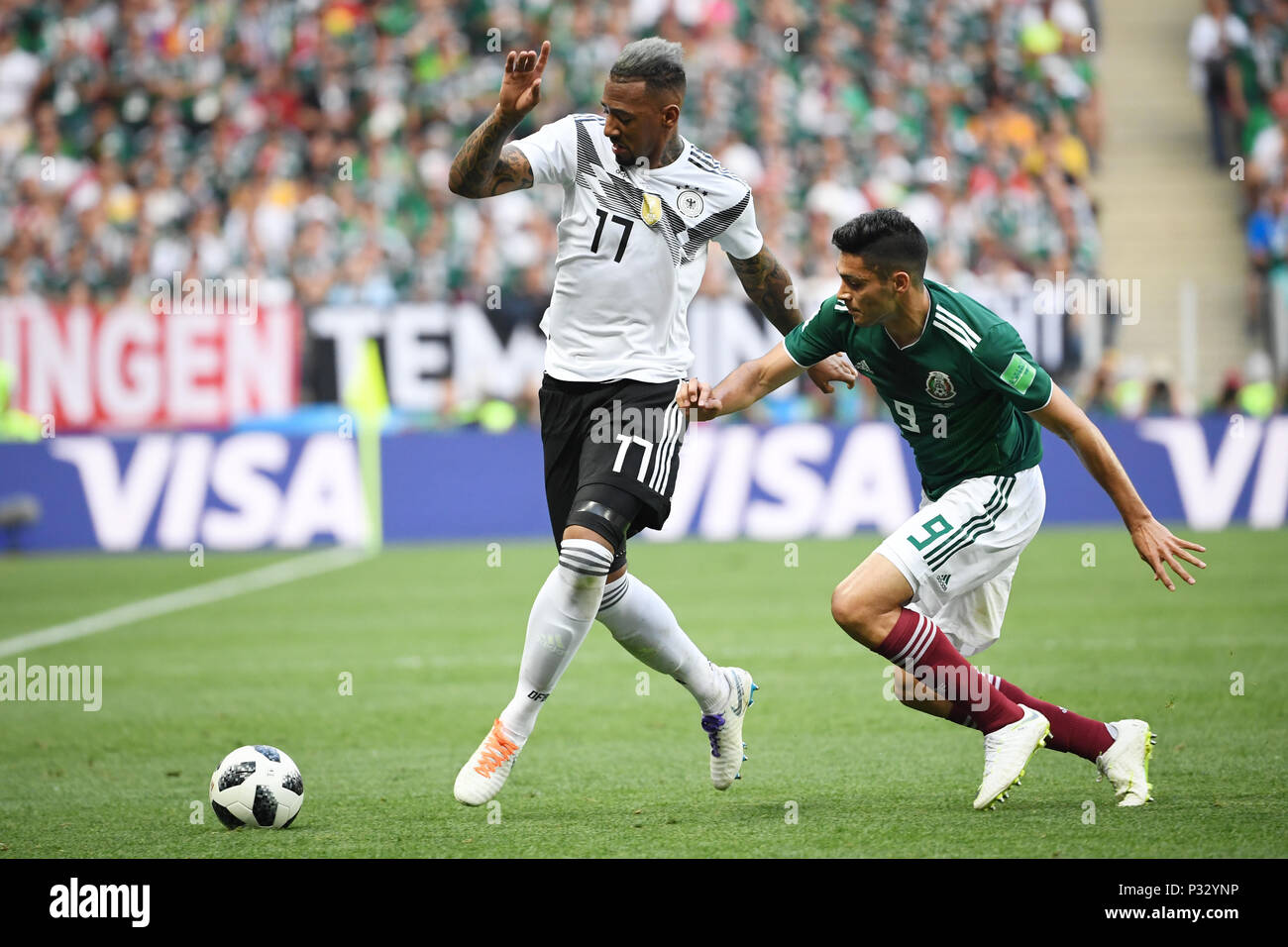 Moscow, Russia. 17th June, 2018. left to right Jerome Boateng (Germany), Raul Jimenez (Mexico). GES/Football/World Cup 2018 Russia: Germany - Mexico, 17.06.2018 GES/Soccer/Football/Worldcup 2018 Russia: Germany vs Mexico, Moscow, June 17, 2018 | usage worldwide Credit: dpa/Alamy Live News Stock Photo