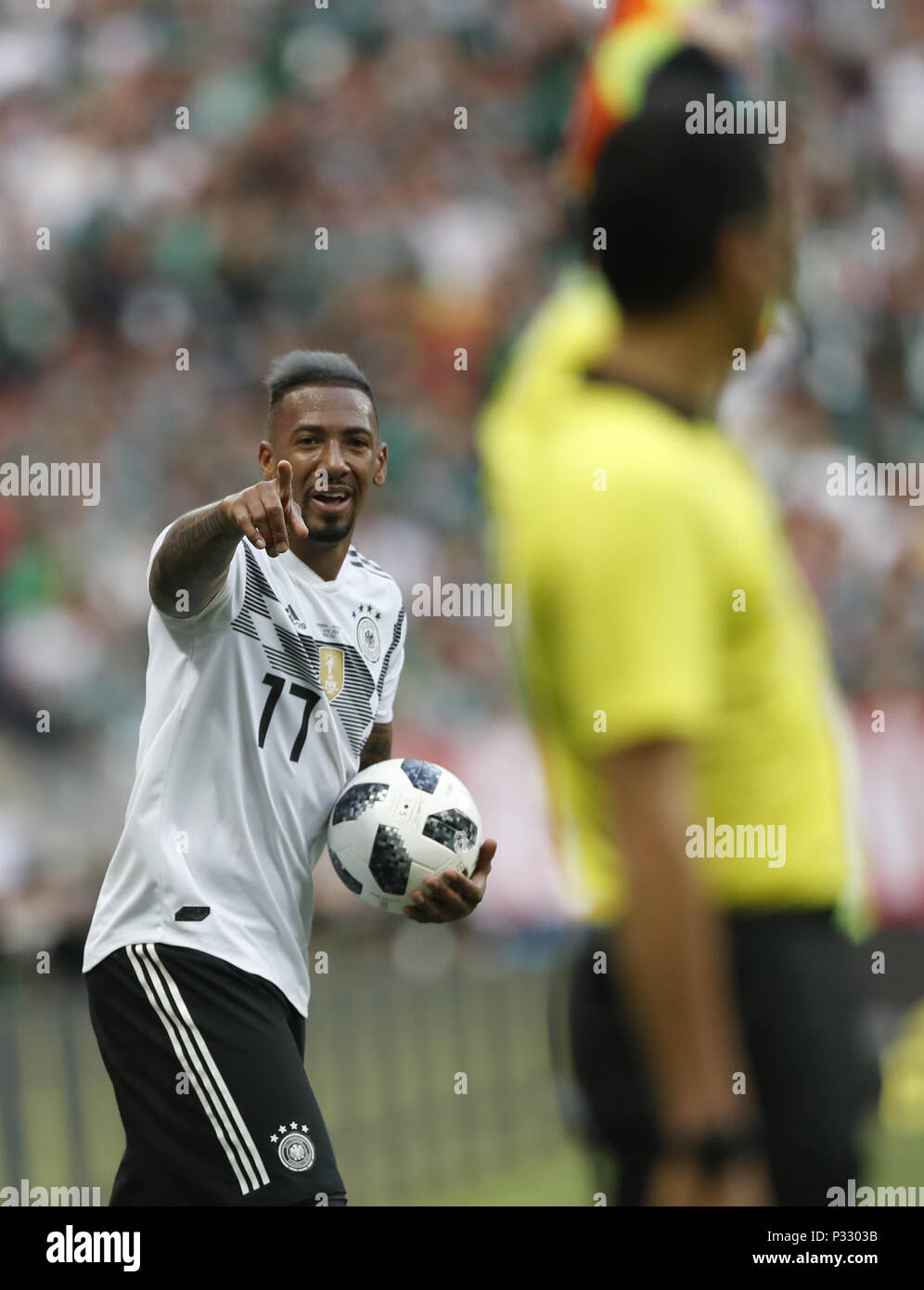 Moscow, Russia. 17th June, 2018. Jerome Boateng (L) of Germany reacts during a group F match between Germany and Mexico at the 2018 FIFA World Cup in Moscow, Russia, June 17, 2018. Mexico won 1-0. Credit: Cao Can/Xinhua/Alamy Live News Stock Photo