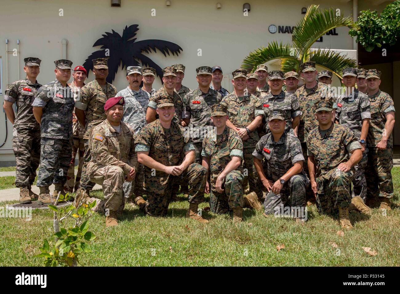 Members of 3D Civil Affairs Group (3D CAG), a subordinate command of Force Headquarters Group (FHG), pose for a photo with their staff counterparts during Ulchi Freedom Guardian 2016 (UFG 16) at Camp Hansen, Okinawa.  During UFG 16, 3D CAG Marines served both on Okinawa and the peninsula.    Exercise UFG 16 is a United Nations Command, U.S. Combined Forces Command, and United States Forces Korea annual joint/combined command post exercise.  The exercise highlights the longstanding and enduring partnership and friendship between the United States and South Korea, and the nations’ combined commi Stock Photo