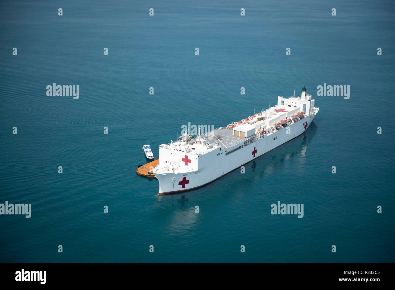 U.S. Navy hospital ship USNS Mercy (T-AH 19) sits anchored off the coast of Padang, during Pacific Partnership 2016's fifth and final mission stop in Padang, Indonesia, Aug. 29, 2016. Pacific Partnership is an annual deployment of forces designed to strengthen maritime and humanitarian partnerships during disaster relief operations, while providing humanitarian, medical, dental and engineering assistance to nations of the Pacific. (U.S. Navy photo by Mass Communication Specialist 3rd Class Trevor Kohlrus) Stock Photo