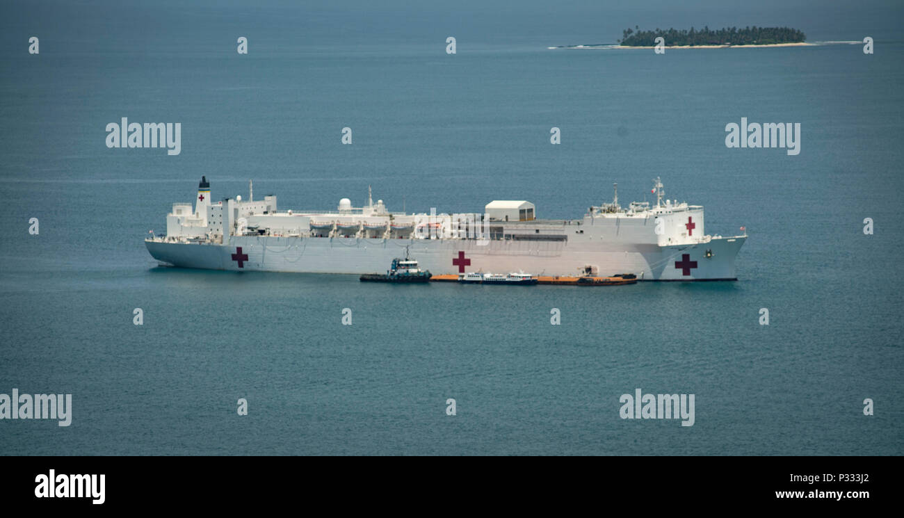 U.S. Navy hospital ship USNS Mercy (T-AH 19) sits anchored off the coast of Padang, during Pacific Partnership 2016's fifth and final mission stop in Padang, Indonesia, Aug. 28, 2016. Pacific Partnership is an annual deployment of forces designed to strengthen maritime and humanitarian partnerships during disaster relief operations, while providing humanitarian, medical, dental and engineering assistance to nations of the Pacific. (U.S. Navy photo by Mass Communication Specialist 3rd Class Trevor Kohlrus) Stock Photo