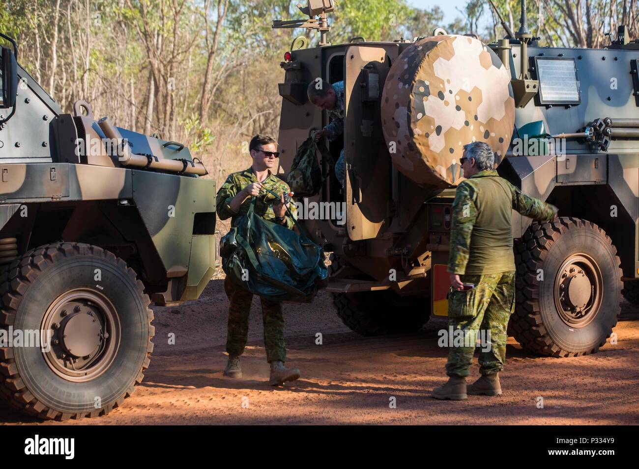 U.S. Marines and soldiers, Australian Army soldiers, and the People’s Liberation Army soldiers arrive to their first location for Exercise Kowari in the Northern Territory, Australia, August 28, 2016. The purpose of Exercise Kowari is to enhance the United States, Australia, and China’s friendship and trust, through trilateral cooperation in the Indo-Asia-Pacific region. (U.S. Marine Corps photo by Lance Cpl. Osvaldo L. Ortega III/Released) Stock Photo