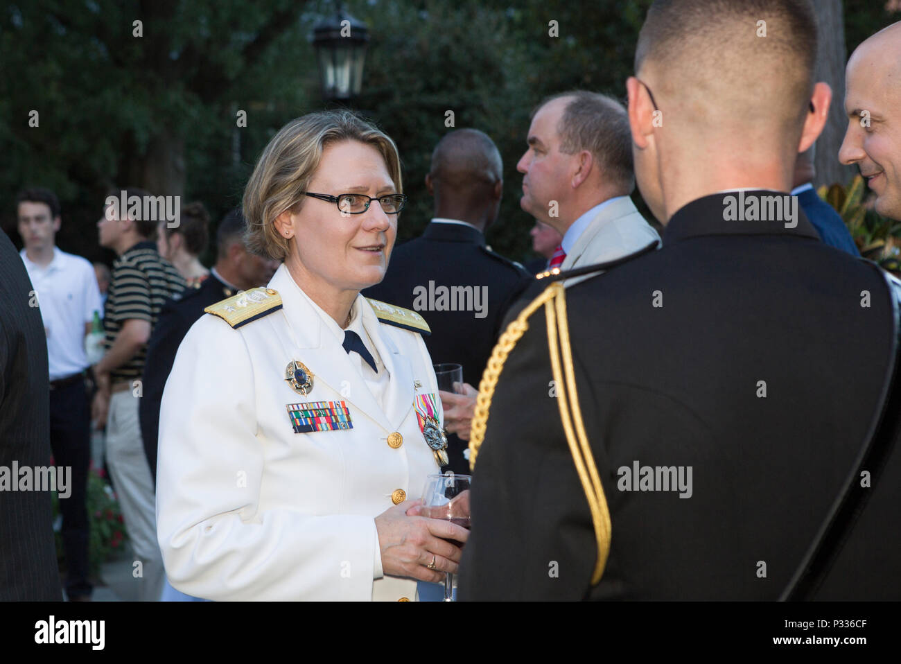 U.S. Coast Guard Rear Adm. Linda L. Fagan, deputy commandant for Operations, Policy and Capabilities, speaks with guests at the evening parade reception at Marine Barracks Washington, Washington, D.C., Aug. 12, 2016. Evening parades are held as a means of honoring senior officials, distinguished citizens and supporters of the Marine Corps. (U.S. Marine Corps photo by Lance Cpl. Paul A. Ochoa) Stock Photo