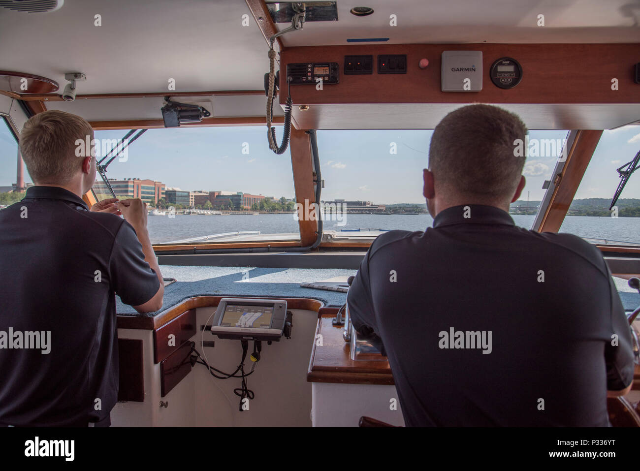 Electrician's Mate Third Class Kevin Lago, barge electrician, and Chief