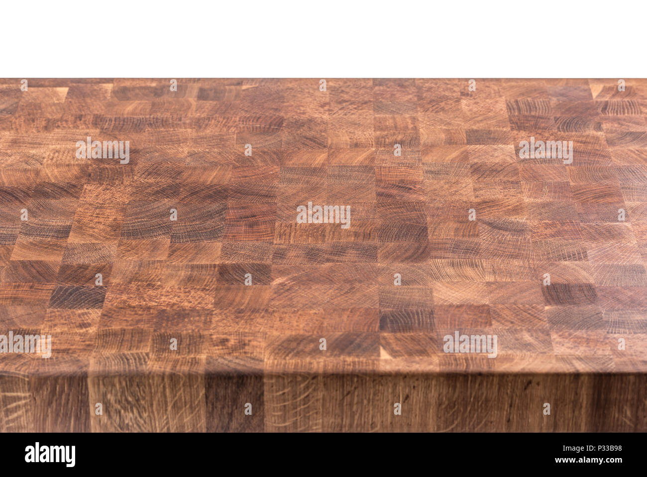 Empty wooden butcher table isolated on white. Stock Photo