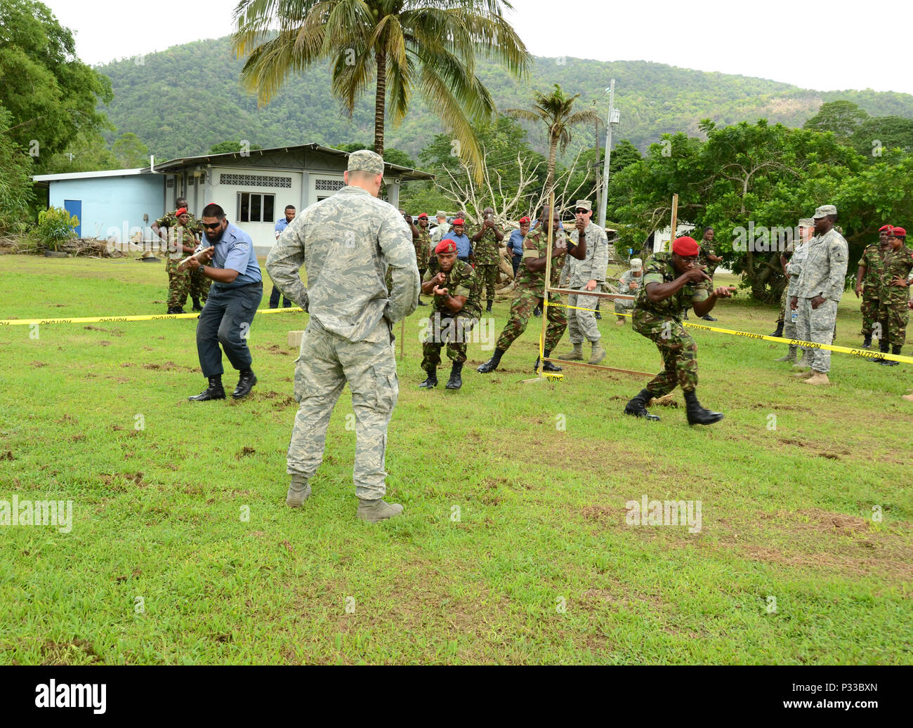 CHAGUARAMAS, Trinidad-  Members of the Delaware National Guard and Trinidad and Tobago Defence Force participated in a simulated room clearance training demonstration on August 10, 2016. (U.S Air National Guard photo by TSgt Gwendolyn Blakley) Stock Photo