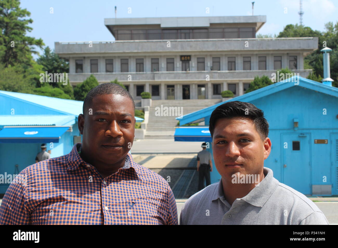 Sgt. Byron Nunn and Spc. Salomn Garcia-Padilla, Forward Support Company J, 2nd Battalion, 8th Cavalry Regiment “Stallions,” 1st Armored Brigade Combat Team, 1st Cavalry Division, visit the Joint Security Area in the Demilitarized Zone separating North and South Korea, as part of a tour Aug. 16. Soldiers visited the JSA, Camp Bonifas, the “Bridge of No Return” and several other points of interest, during the tour. (U.S. Army photo by Spc. Jeremy Reuse, 2nd Battalion, 8th Cavalry Regiment, 1st Armored Brigade Combat Team, 1st Cav. Div.) Stock Photo