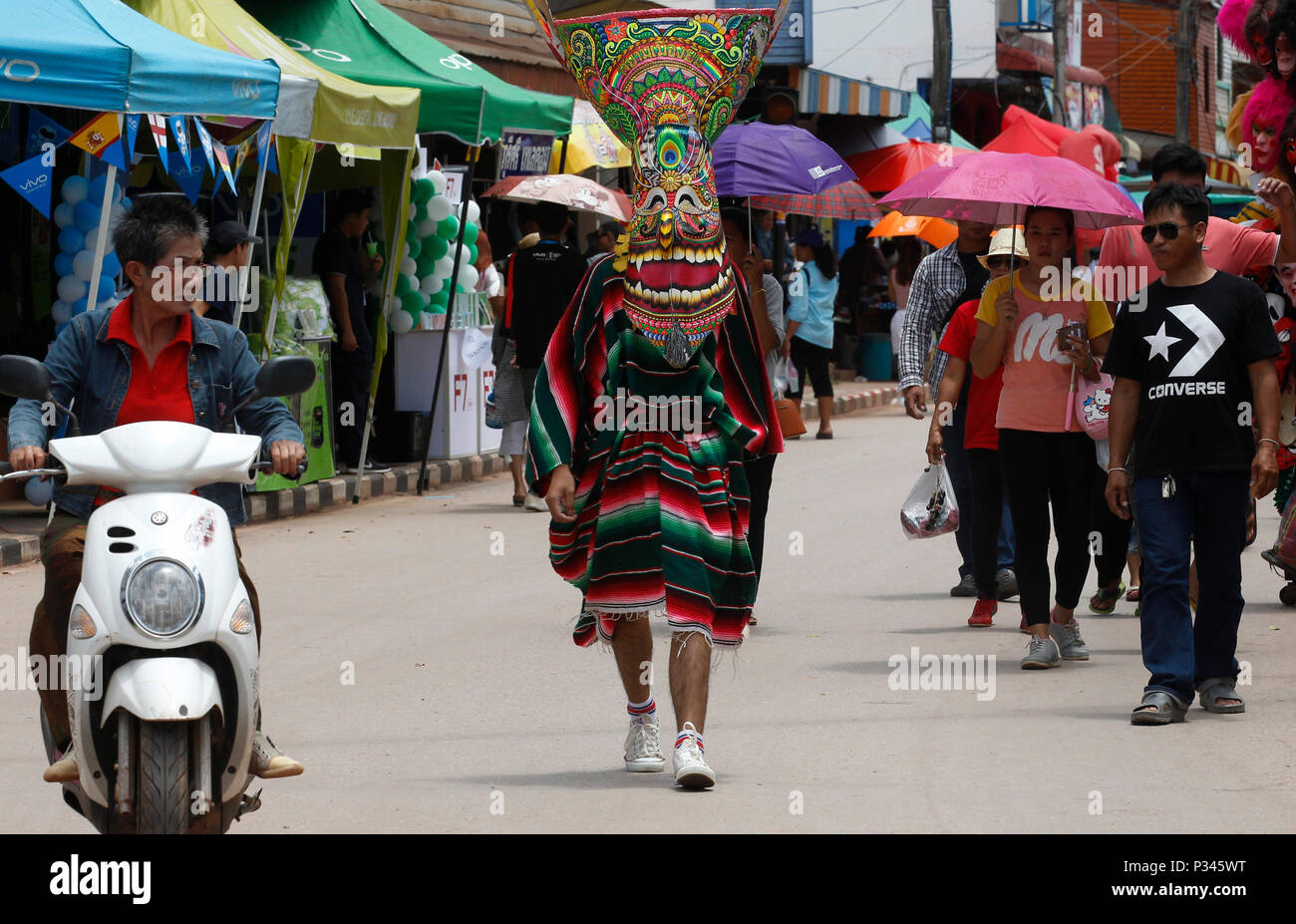 Thailand. 16th June, 2018. Thais wear masks representing the spirits of the dead springing back to life at the annual Phi Ta Khon, or Ghost festival in Dan Sai, Loei province, northeast of Bangkok on June 16, 2018. The event was held to promote tourism in Thailand. Credit: Chaiwat Subprasom/Pacific Press/Alamy Live News Stock Photo