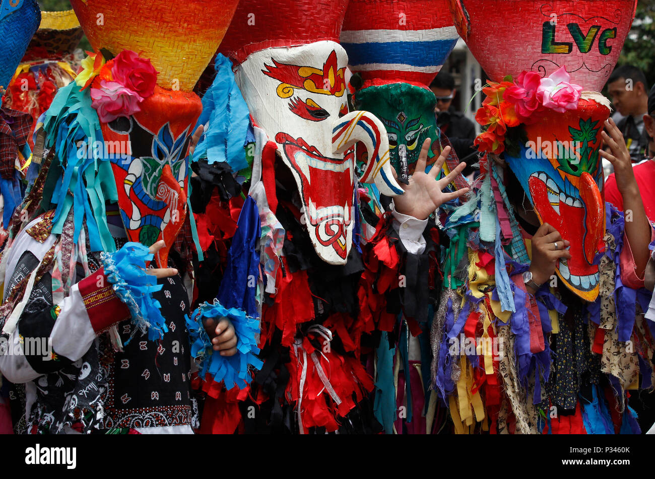 Thailand. 16th June, 2018. Thais wear masks representing the spirits of the dead springing back to life at the annual Phi Ta Khon, or Ghost festival in Dan Sai, Loei province, northeast of Bangkok on June 16, 2018. The event was held to promote tourism in Thailand. Credit: Chaiwat Subprasom/Pacific Press/Alamy Live News Stock Photo