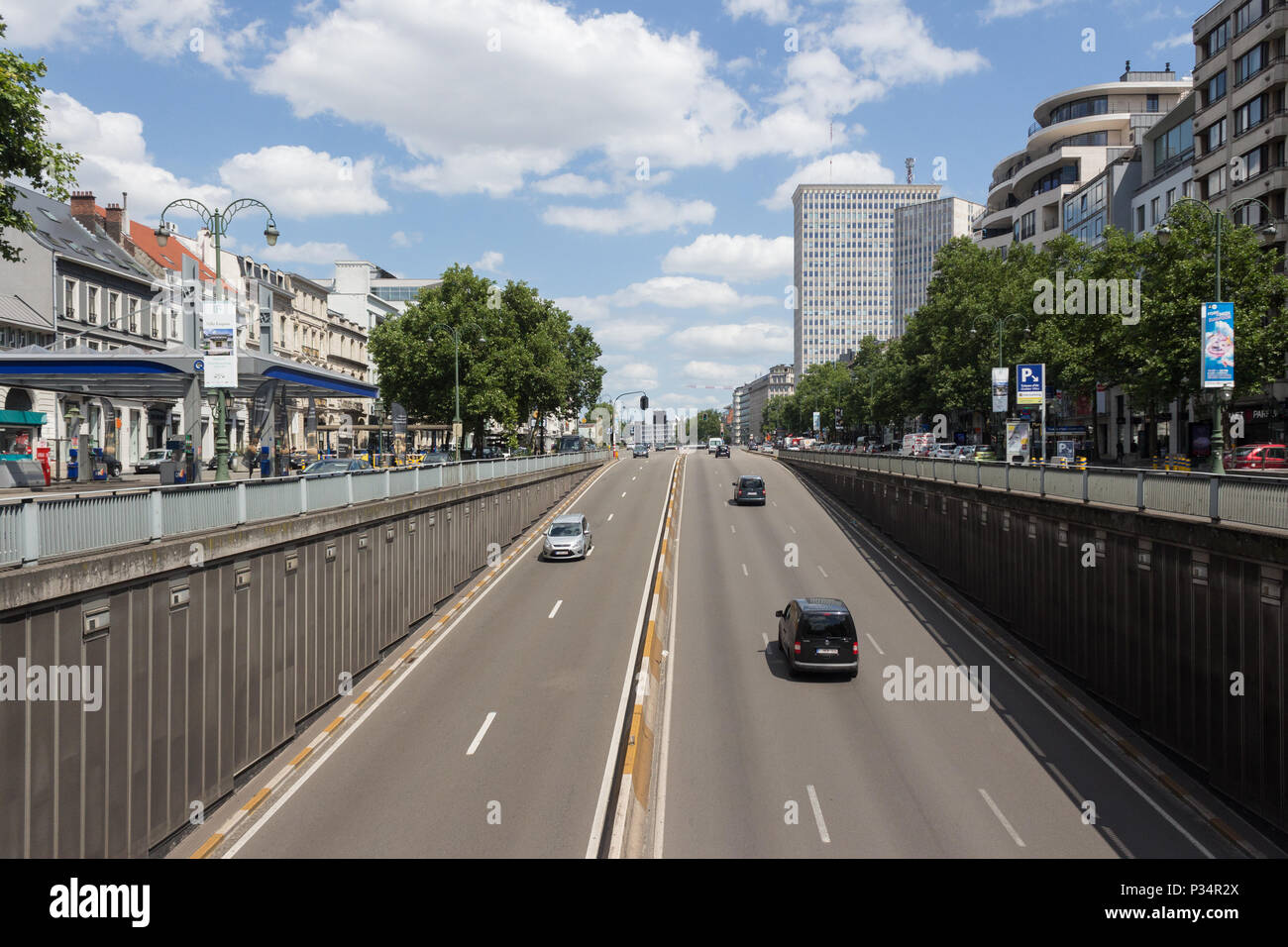 Cars coming out of tunnel in the city - Brussels, Belgium Stock Photo