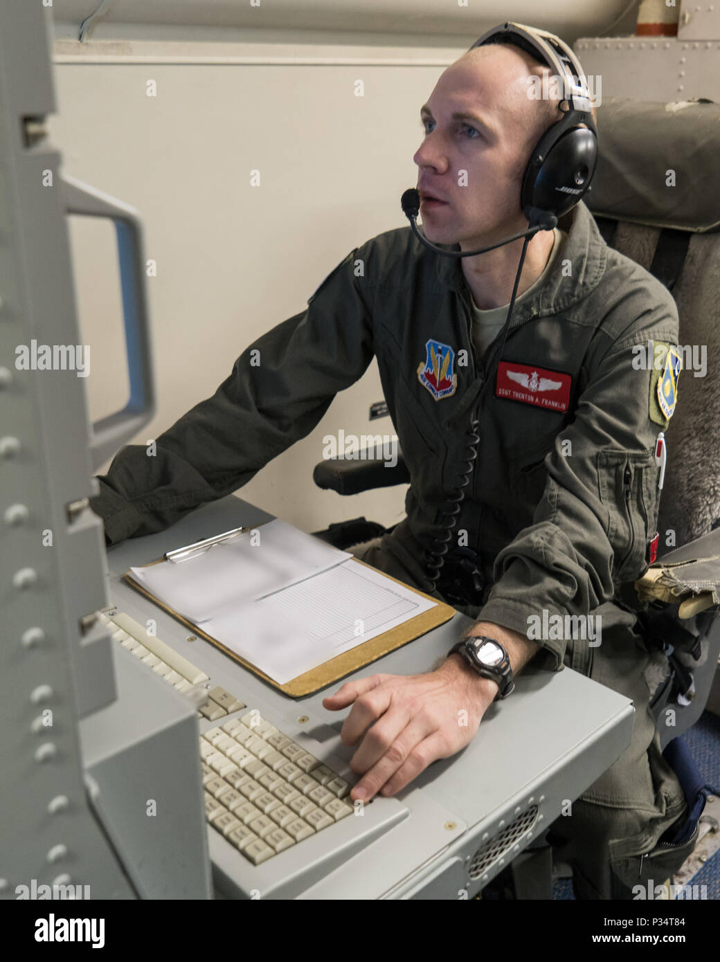 U.S. Air Force Staff Sgt. Trenton Franklin, a senior director technician with the 461st Air Control Wing (ACW), monitors ground moving target indication data from his operator work station on a E-8C Joint STARS during a mission supporting BALTOPS and Saber Strike 18 exercises at Fighter Wing Skrydstrup, Denmark, June 12, 2018. The JSTARS team consists of the Georgia Air National Guard’s 116th ACW, plus active duty personnel assigned to the 461st ACW and Army JSTARS. They are in Denmark to participate in Exercise Baltic Operations, or BALTOPS, June 4-15 and Saber Strike 18 from June 3-15. JSTAR Stock Photo