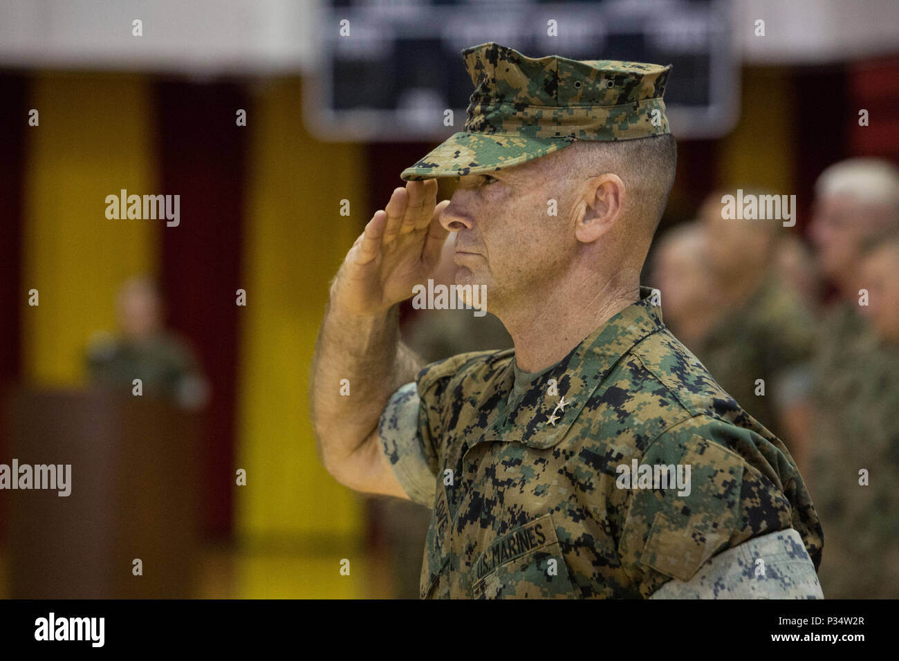 U.S. Marine Corps Maj. Gen. John K. Love, the Commanding General of 2nd Marine Division, salutes during the 6th Marine Regiment change of command ceremony at Camp Lejeune, N.C., June 12, 2018. During the ceremony, Col. Matthew S. Reid relinquished command of the unit to Col. Daniel T. Canfield Jr. (U.S. Marine Corps photo by Pfc. Nathaniel Q. Hamilton) Stock Photo