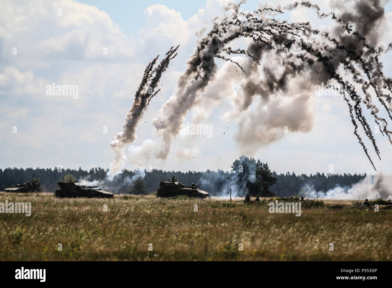 Polish army Rak 120mm Self-Propelled Mortar Systems with 15th Mechanized Brigade, fire for effect during a lethality demonstration for exercise Puma 2 with Battle Group Poland at Bemowo Piskie Training Area, Poland on June 15, 2018 as part of Saber Strike 18. This year's exercise, which runs from June 3-15, tests allies and partners from 19 countries on their ability work together to deter aggression in the region and improve each unit's ability to perform their designated mission. (U.S. Army photo by Spc. Hubert D. Delany III /22nd Mobile Public Affairs Detachment) Stock Photo
