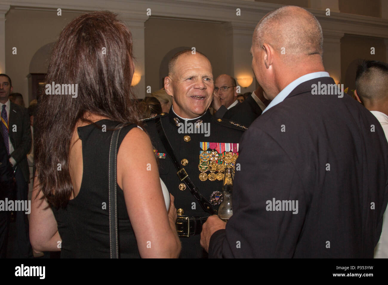 Commandant of the Marine Corps Gen. Robert B. Neller, center, speaks ...
