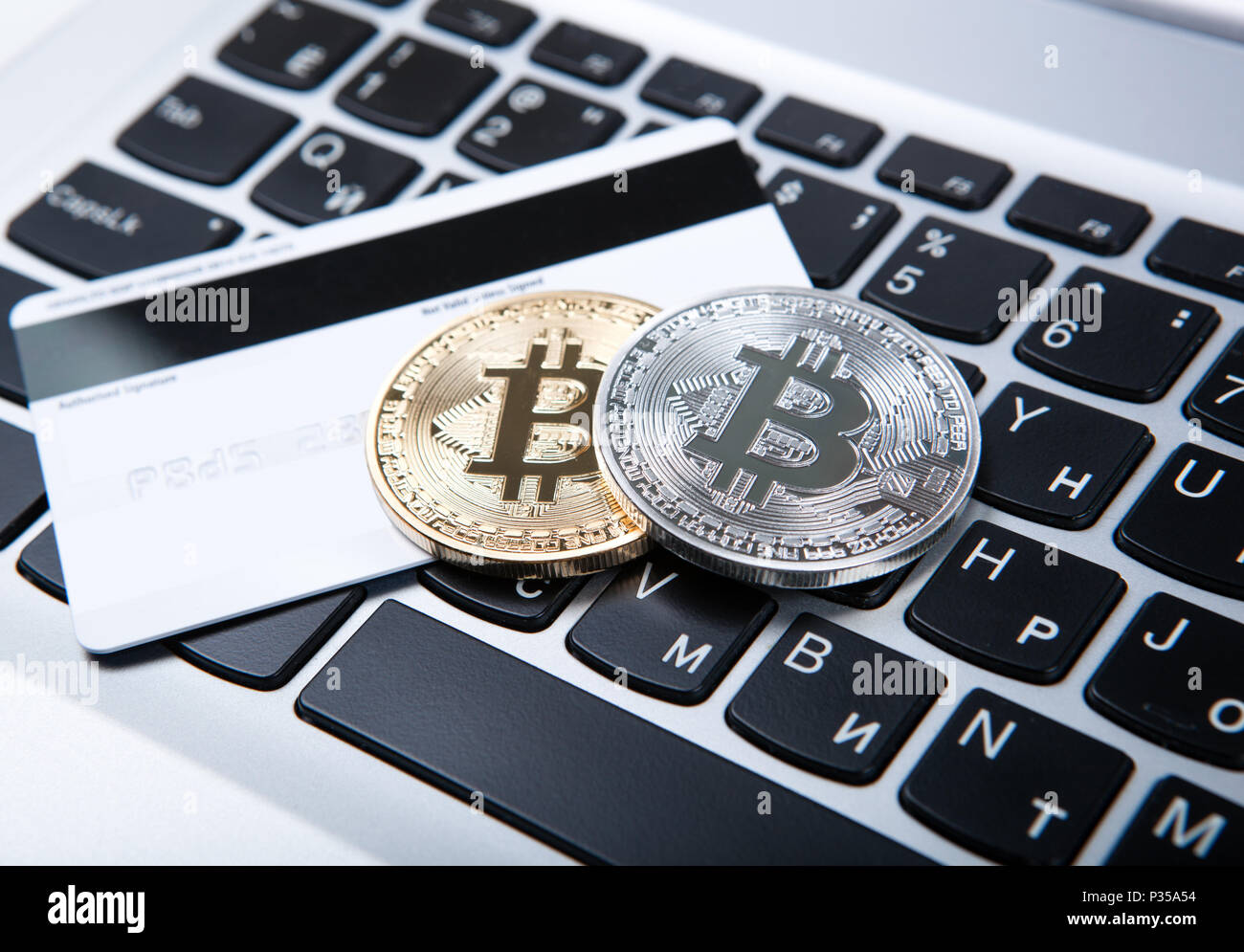 Bitcoin Computer Bank Coins bitcoin keyboard bank card hi-res stock photography and images ...